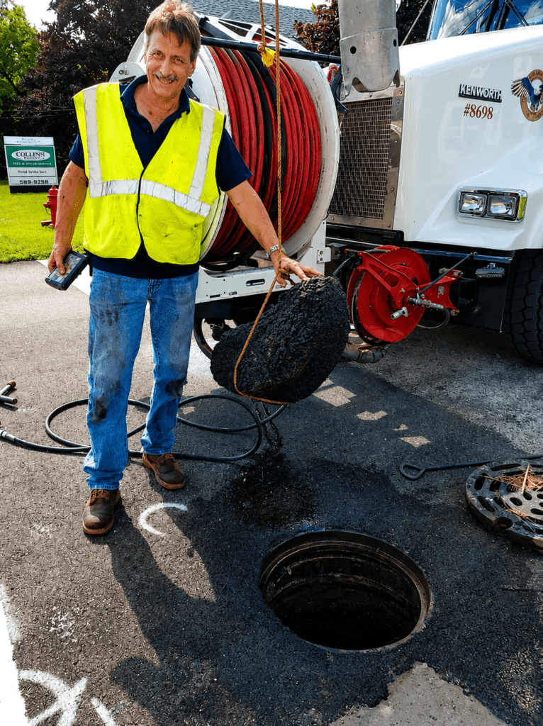 Man over a manhole